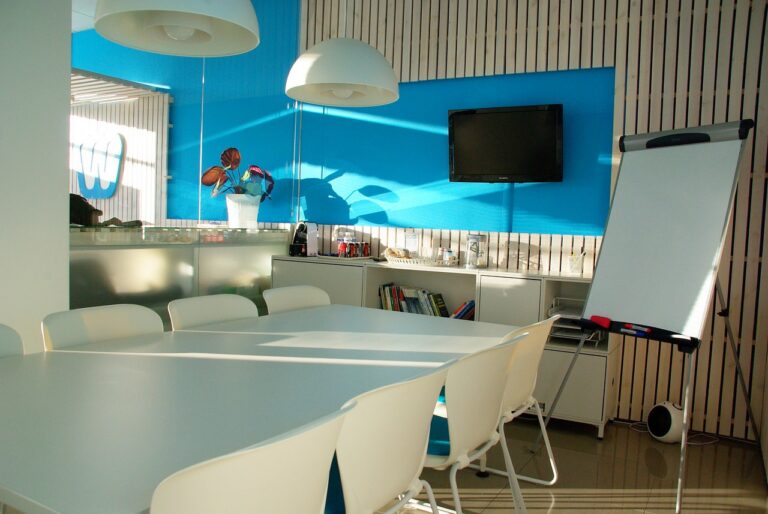 Office meeting area with a blue feature wall