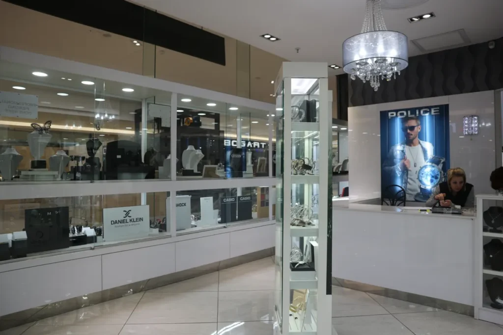 Illuminated jewellery display cabinets and chandelier
