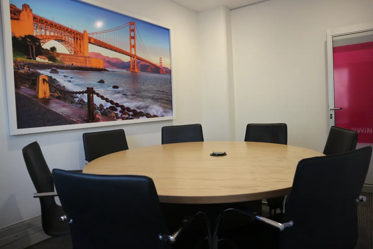 Themed boardroom with a Golden Gate Bridge mural